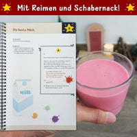 Lebendige Darstellung des Easy-Sticks Wichtelsets mit der farbenfrohen Anleitung zur Zubereitung bunter Milch. Enthält kreative Ideen und Bastelanleitungen, ideal für die Weihnachtszeit, von easy-sticks.