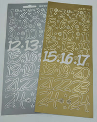 Zwei Blätter mit Adventszahlen Stickern in Gold und Silber, die die Zahlen 1 bis 24 präsentieren. Ideale Auswahl für festliche Dekorationen von easy-sticks.