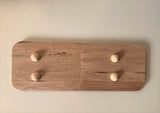 Obenansicht des Dekotabletts von easy-sticks, das mit stabilen Holzkugeln an der Unterseite für einen sicheren Stand sorgt.