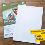 Wasserschiebefolie Selbst Gestalten von easy-sticks, Folienpräsentation auf Holz-Untergrund, ideal für kreative Bastelprojekte mit einfacher Anwendung.